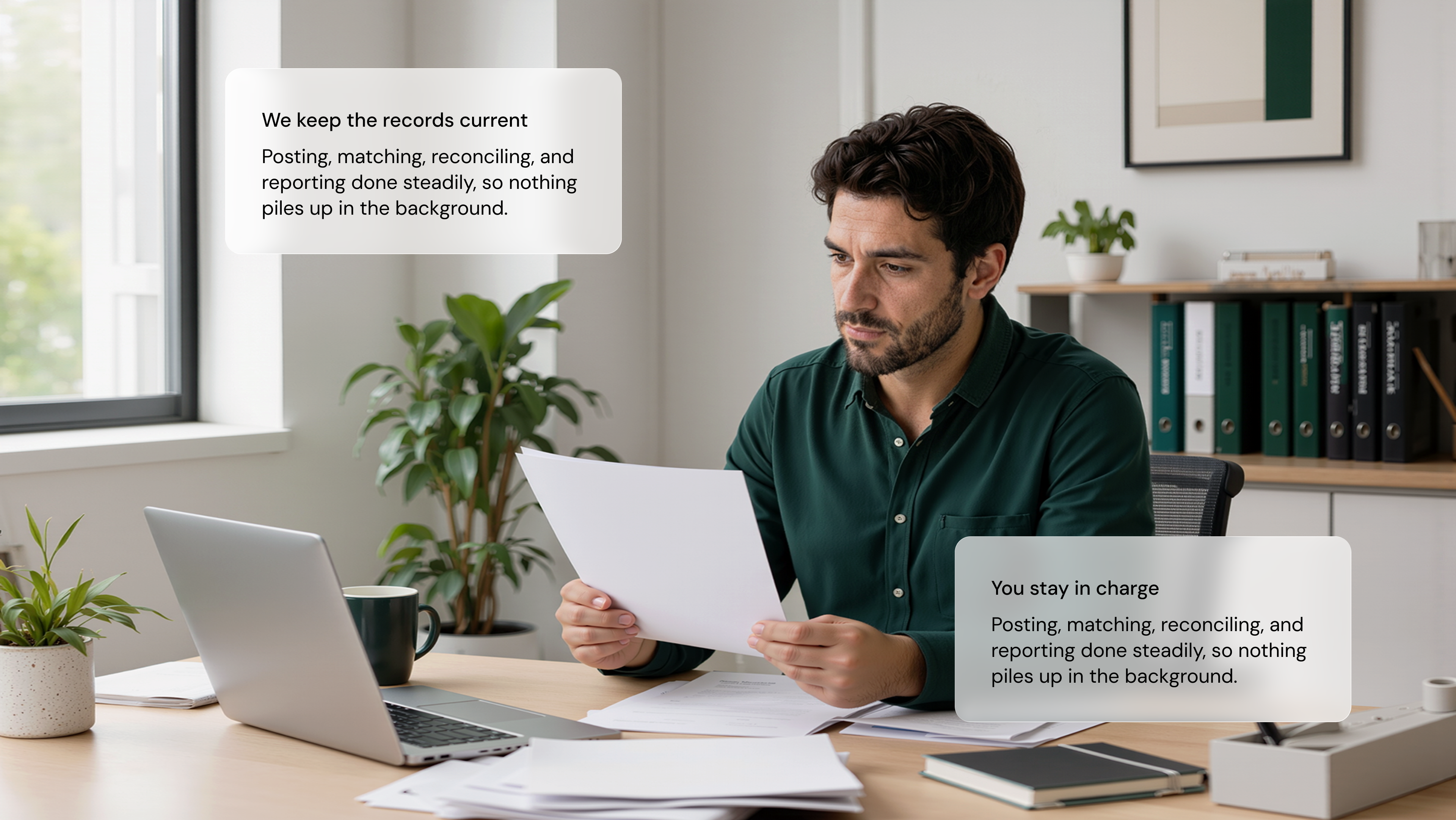 Finance professional reviewing records at a modern workspace
